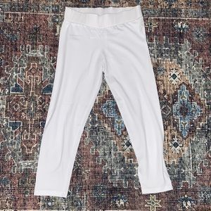 Never worn 3/4 white leggings. Medium. 70cm too to bottom